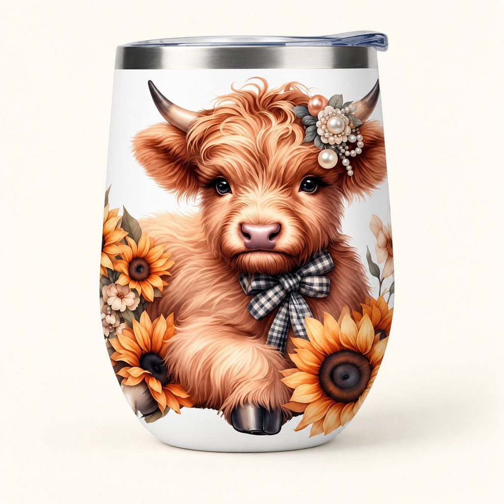 White 12 oz tumbler with sunflower Highland calf artwork, silver-coloured rim and clear lid.