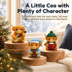 Three miniature Highland cow characters with a guitar, blue sleeping cap and green hat with cocoa, from the 24-day advent calendar.
