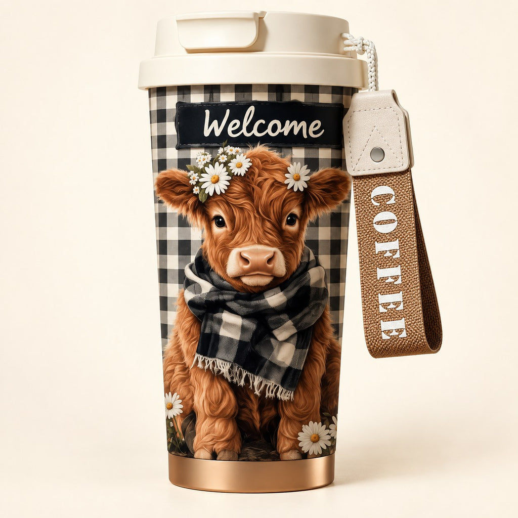 Close-up of the printed daisy Highland cow, Welcome lettering, white lid and COFFEE carry strap.