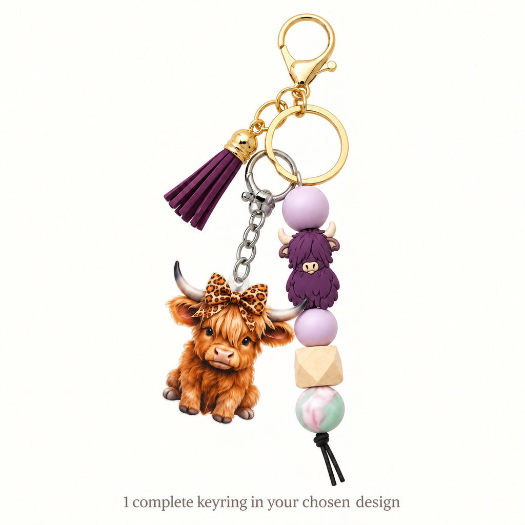 Complete Highland cow beaded keyring with attached tassel and calf charm; one keyring in the chosen design included