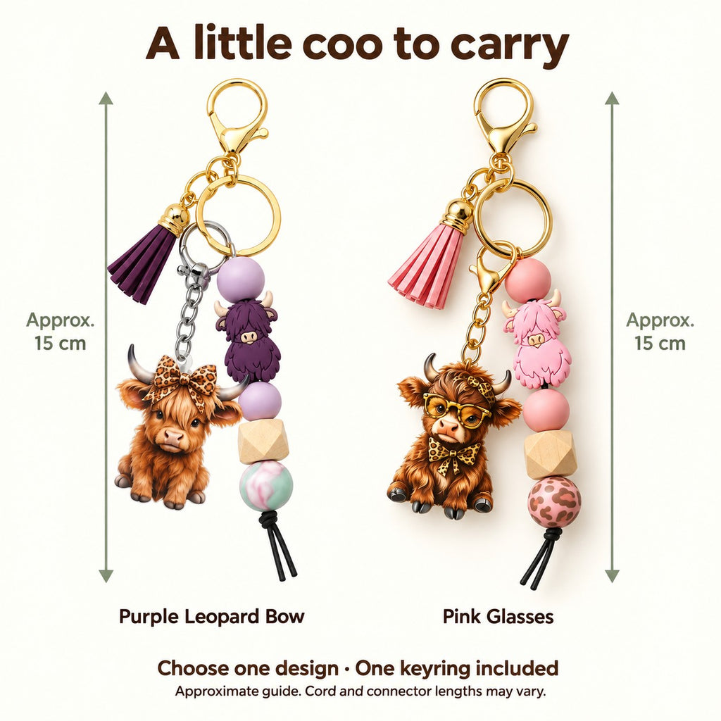 Pink and purple Highland cow beaded tassel keyrings, approximately 15 cm overall including clasp and cord ends. Choose one design; cord and connector lengths may vary.