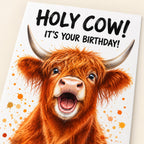 Close-up of the Holy Cow birthday card showing the printed calf artwork and birthday wording.