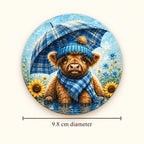 Blue Highland cow umbrella-design coaster with a size guide showing 9.8 cm diameter.