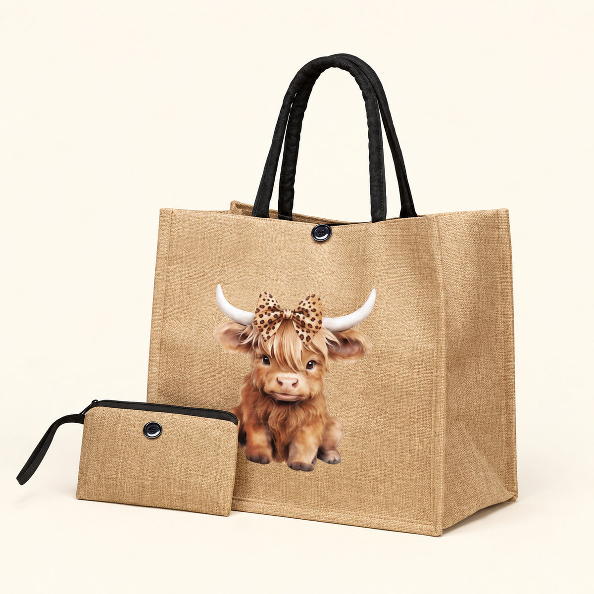 Khaki Highland cow leopard-bow tote bag with fixed black handles and a coordinating plain purse, shown against a cream background.