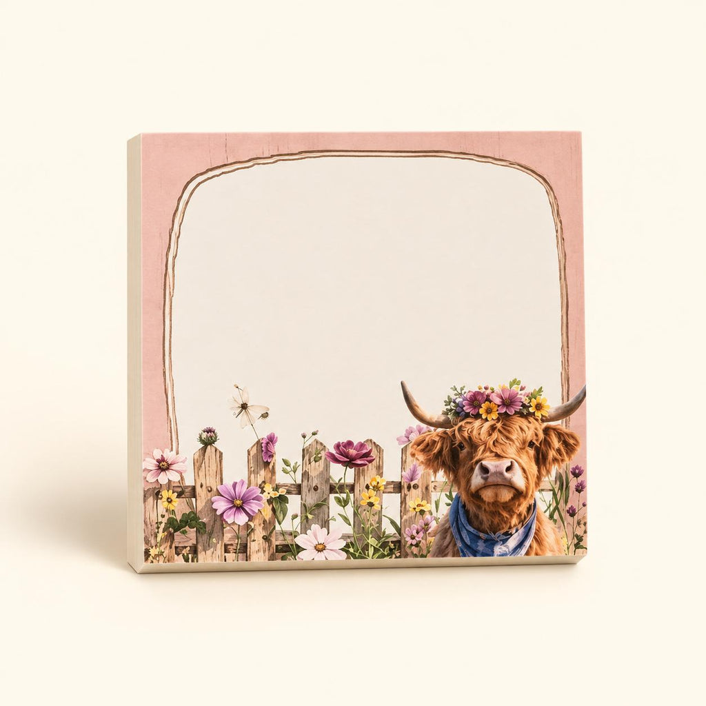 Pink Frame Highland cow sticky-note pad with a pink border, floral fence and flower-crowned cow wearing a blue bandana.