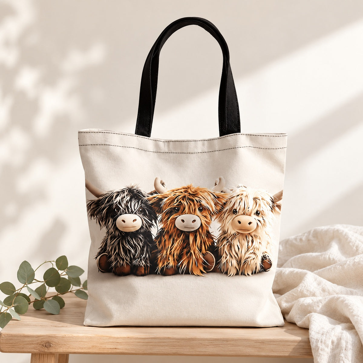 Three Highland Cows Tote Bag. lifestyle.