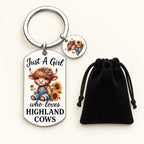 Just a Girl Highland cow keyring with two sunflower calf charms and black velvet gift bag