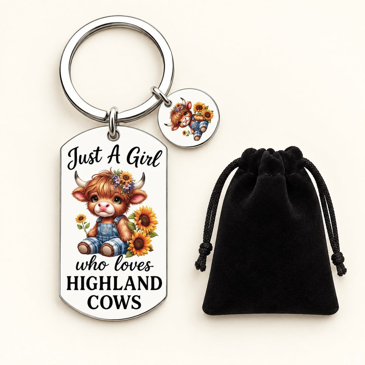 Just a Girl Highland cow keyring with two sunflower calf charms and black velvet gift bag